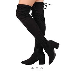 Wide calf thigh high boots
